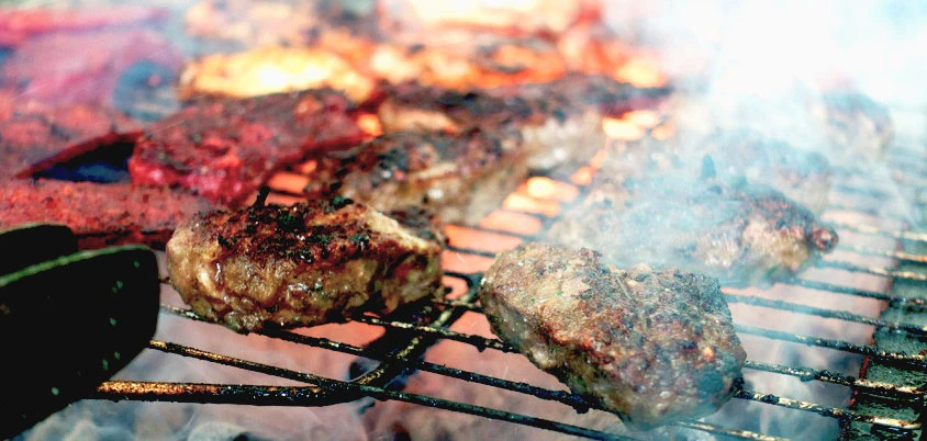 How to use a vertical propane smoker